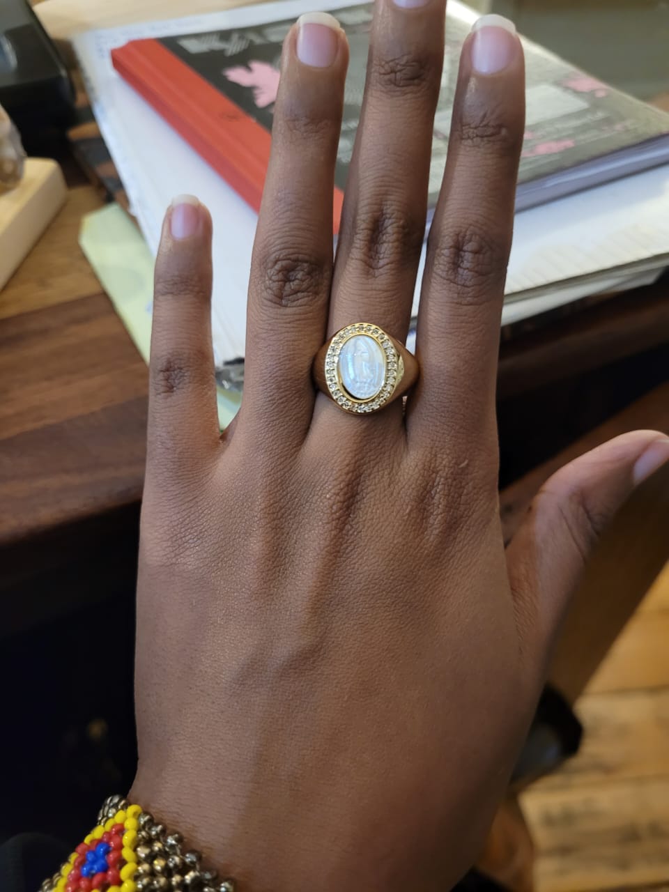 Estones ESR012- Carved mother of pearl ring in 22kgp