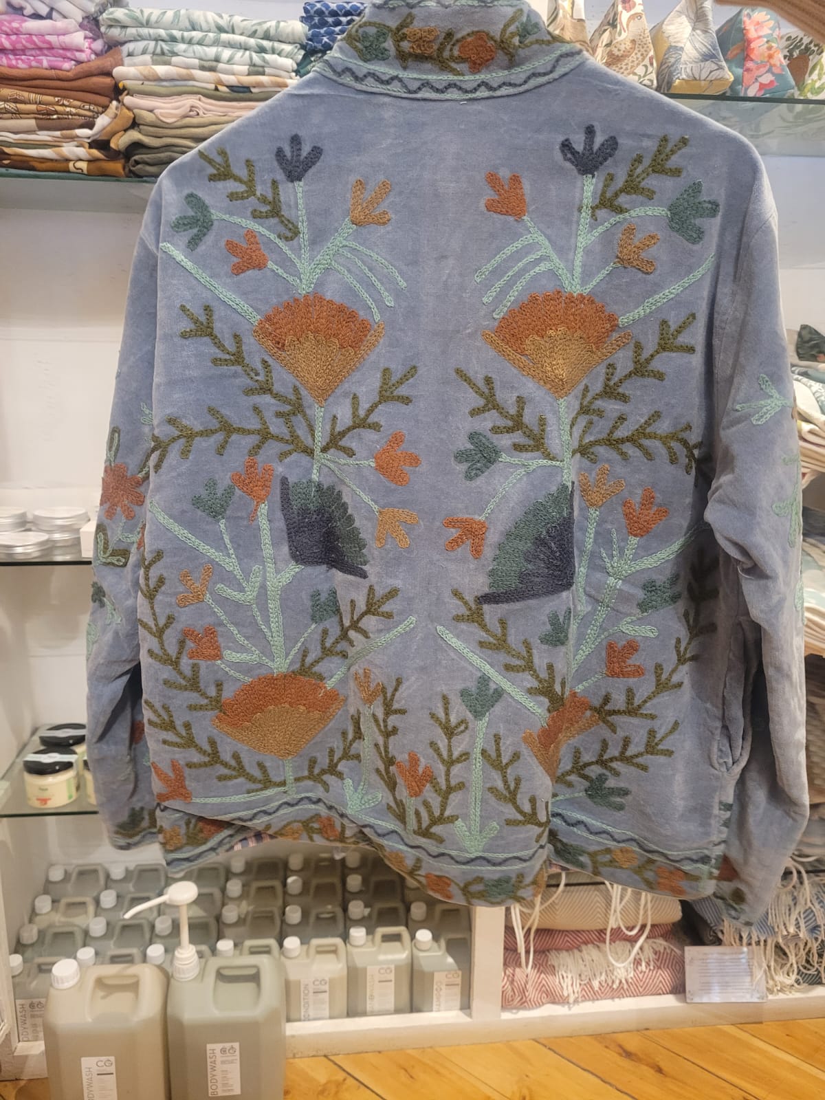 Pastel blue jacket with blue and brown flowers