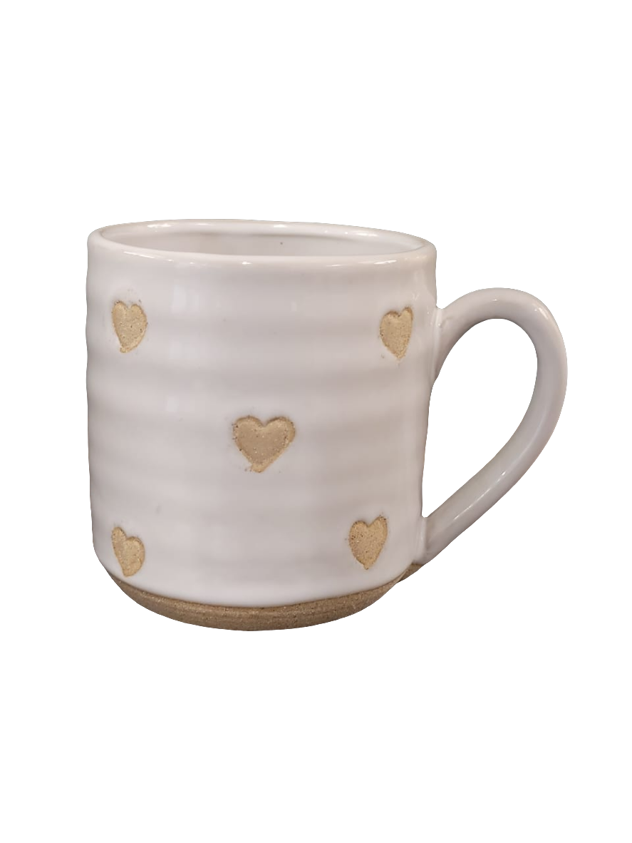White ceramic mug with a hand-painted red heart