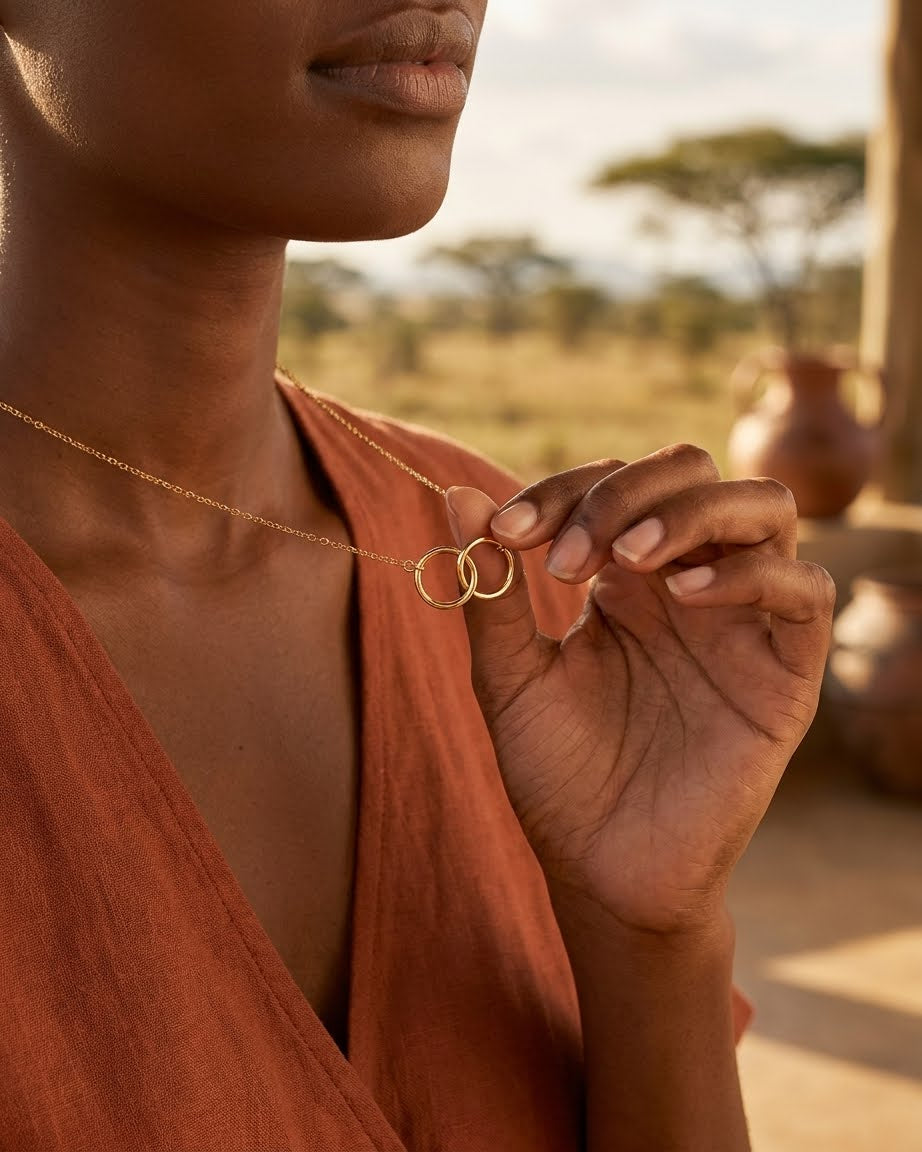 Br two circle karma knot necklace