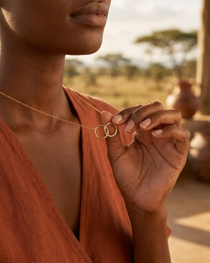 Br two circle karma knot necklace
