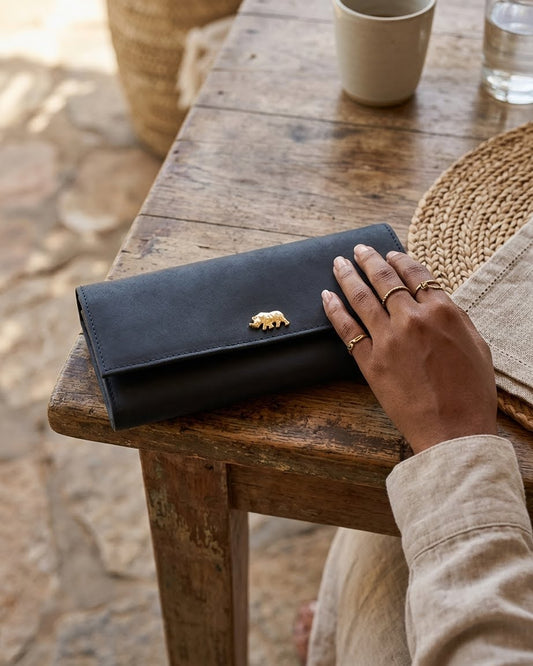Mocca leather purse with brass rhino